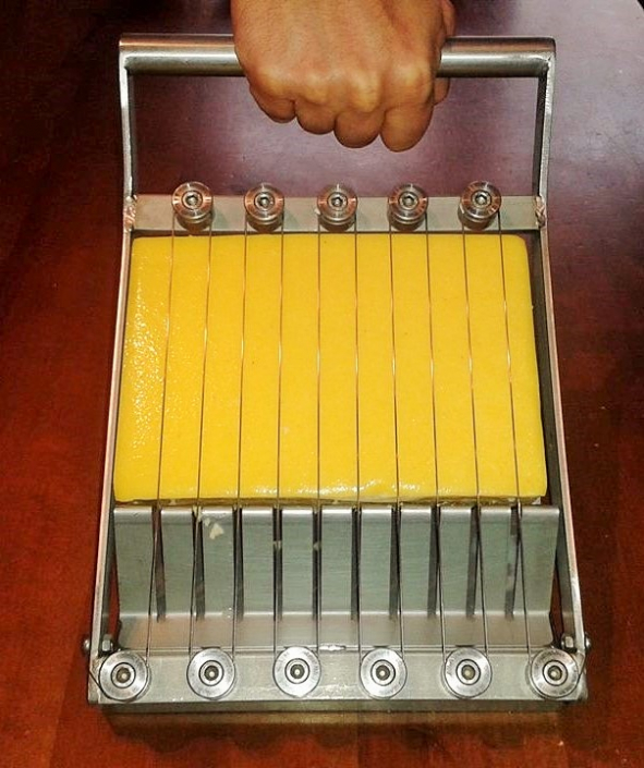 Taglia-polenta-Mibos-pressione